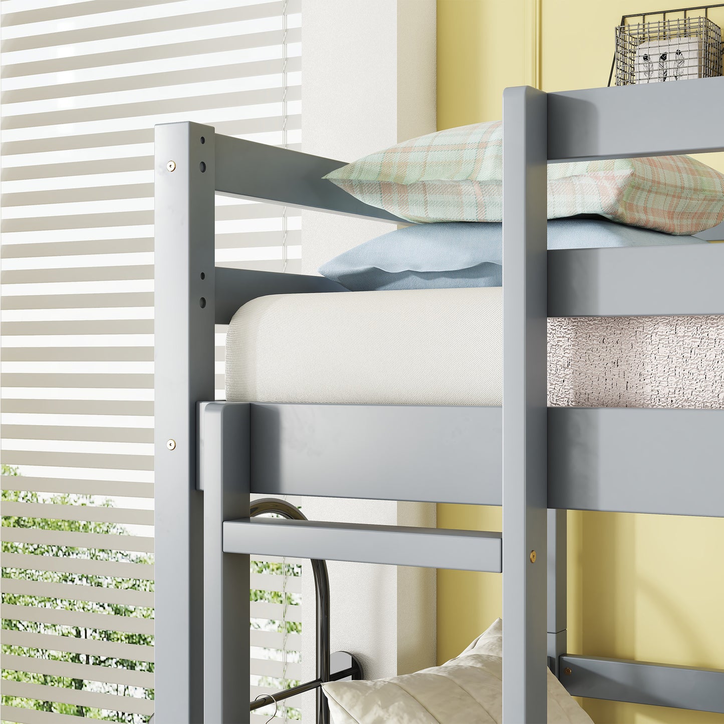 Grey wooden bunk bed frame with patterned pillows