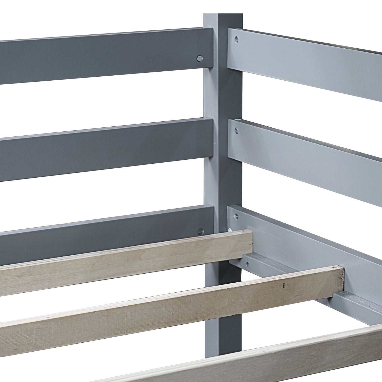Closeup of grey metal bed frame with wooden slats for mattress support