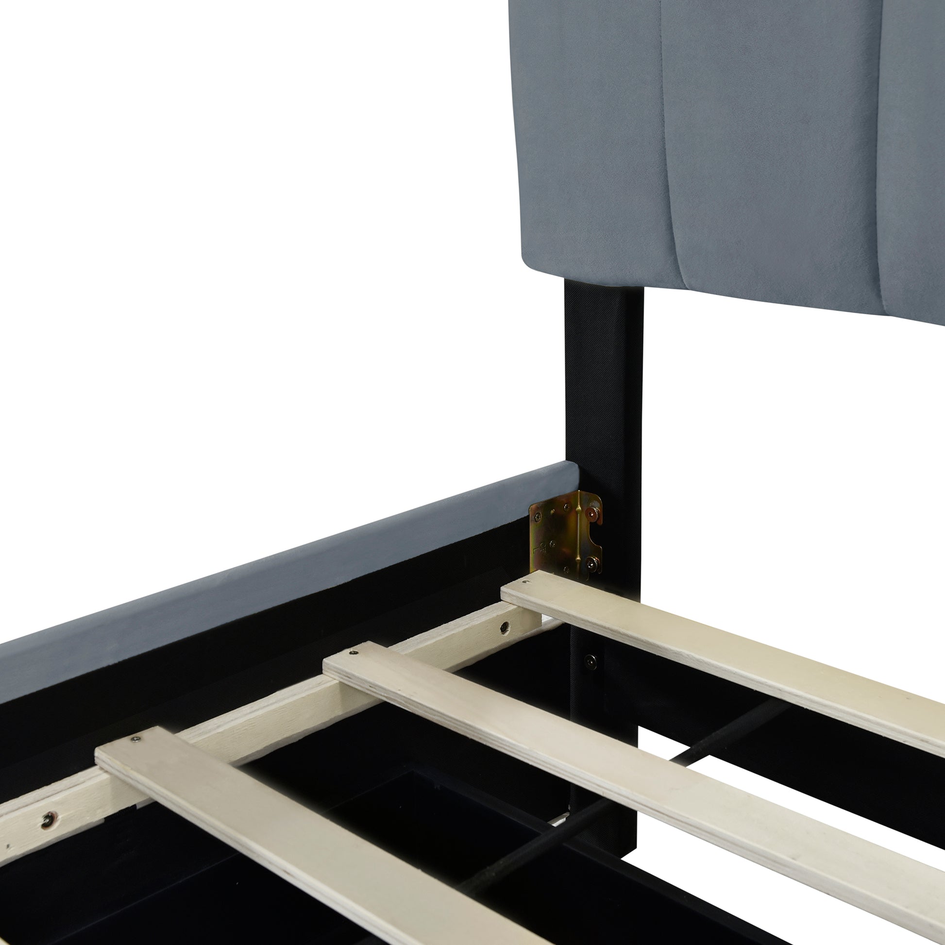 Close up of grey upholstered bed frame with wooden slats for mattress support