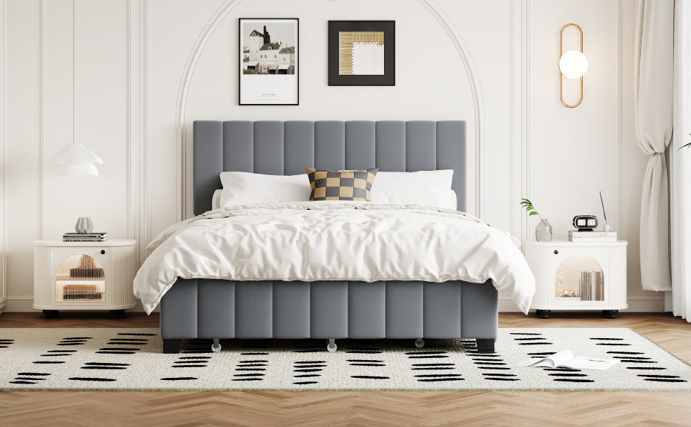 Modern grey upholstered bed frame with tufted headboard and white linens