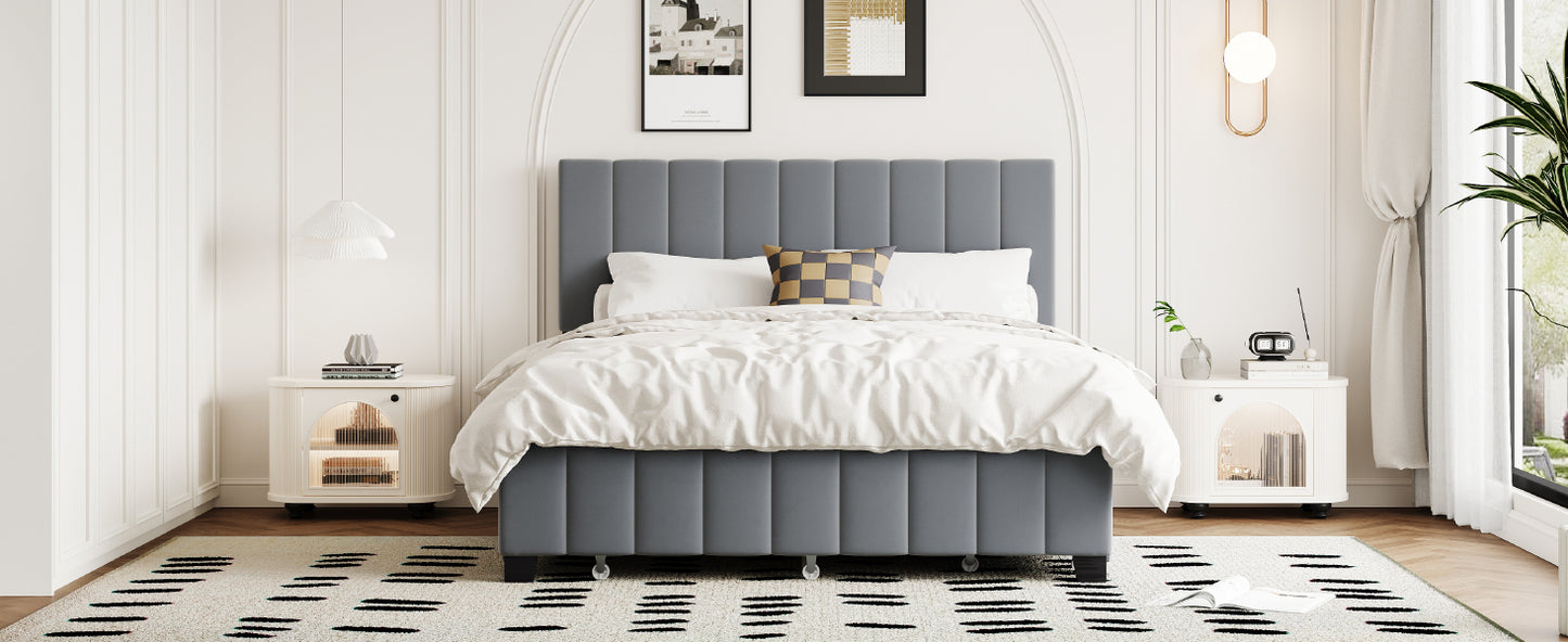 Gray upholstered platform bed with vertical channel tufting on headboard and frame