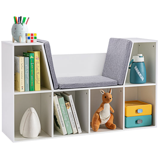 White cube storage unit with builtin gray cushioned bench and childrens books