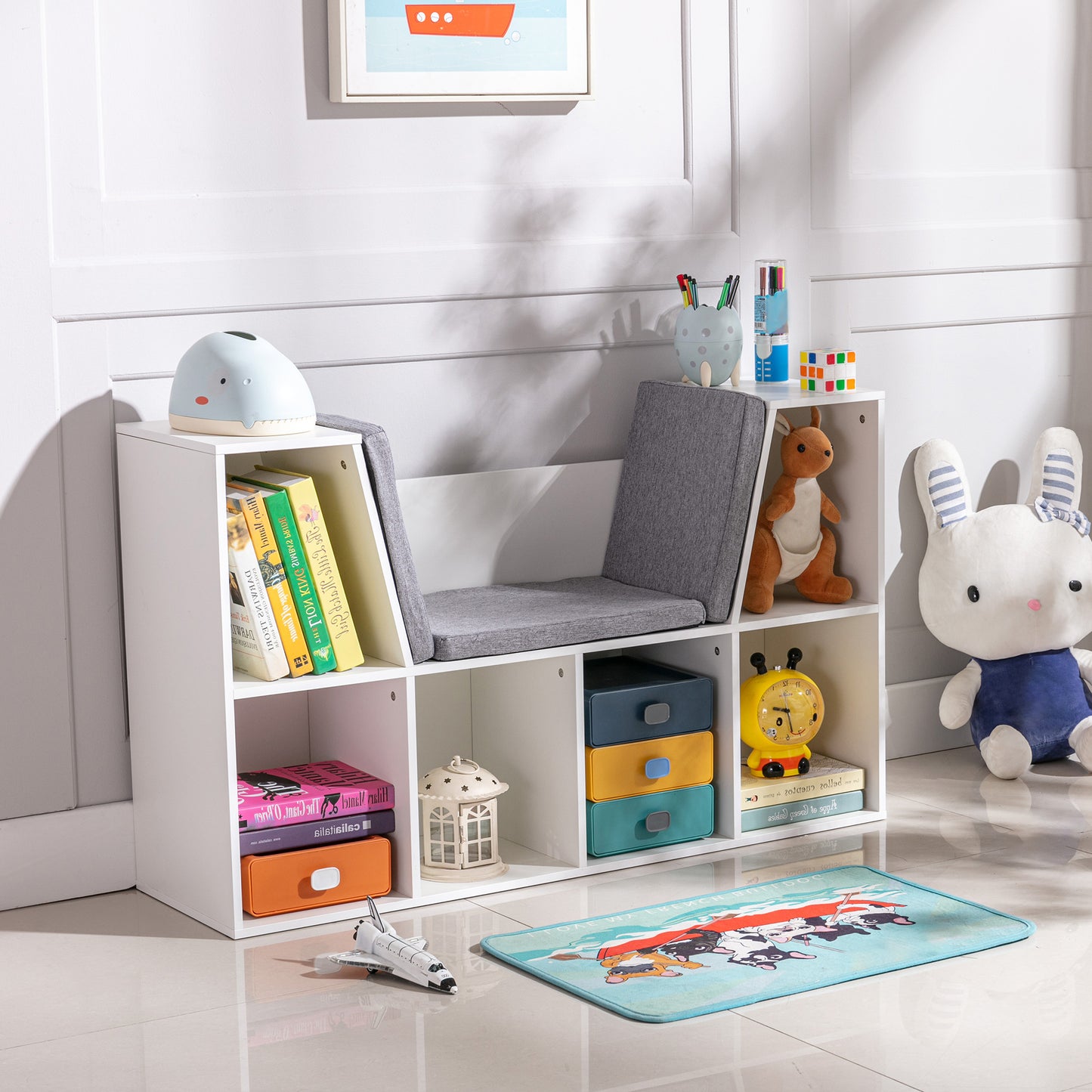 White modular kids storage bench with grey cushions and book cubbies