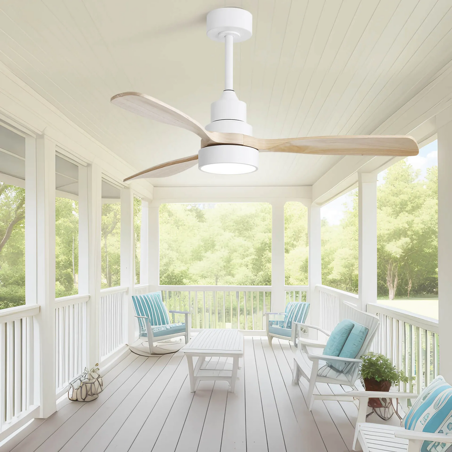 Modern white ceiling fan with natural wood blades and integrated LED light ideal for covered patios