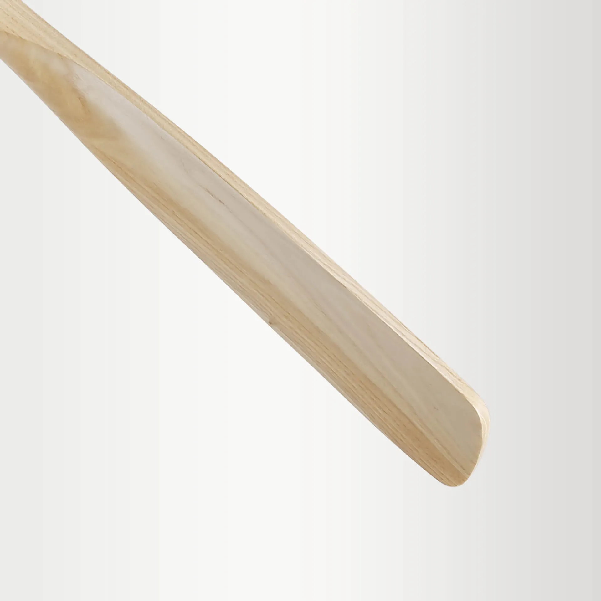 Natural wood shoe horn with a smooth polished finish for effortless wear