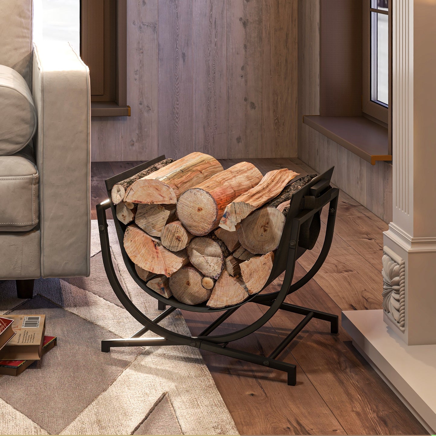 Black metal firewood rack filled with logs next to a beige sofa