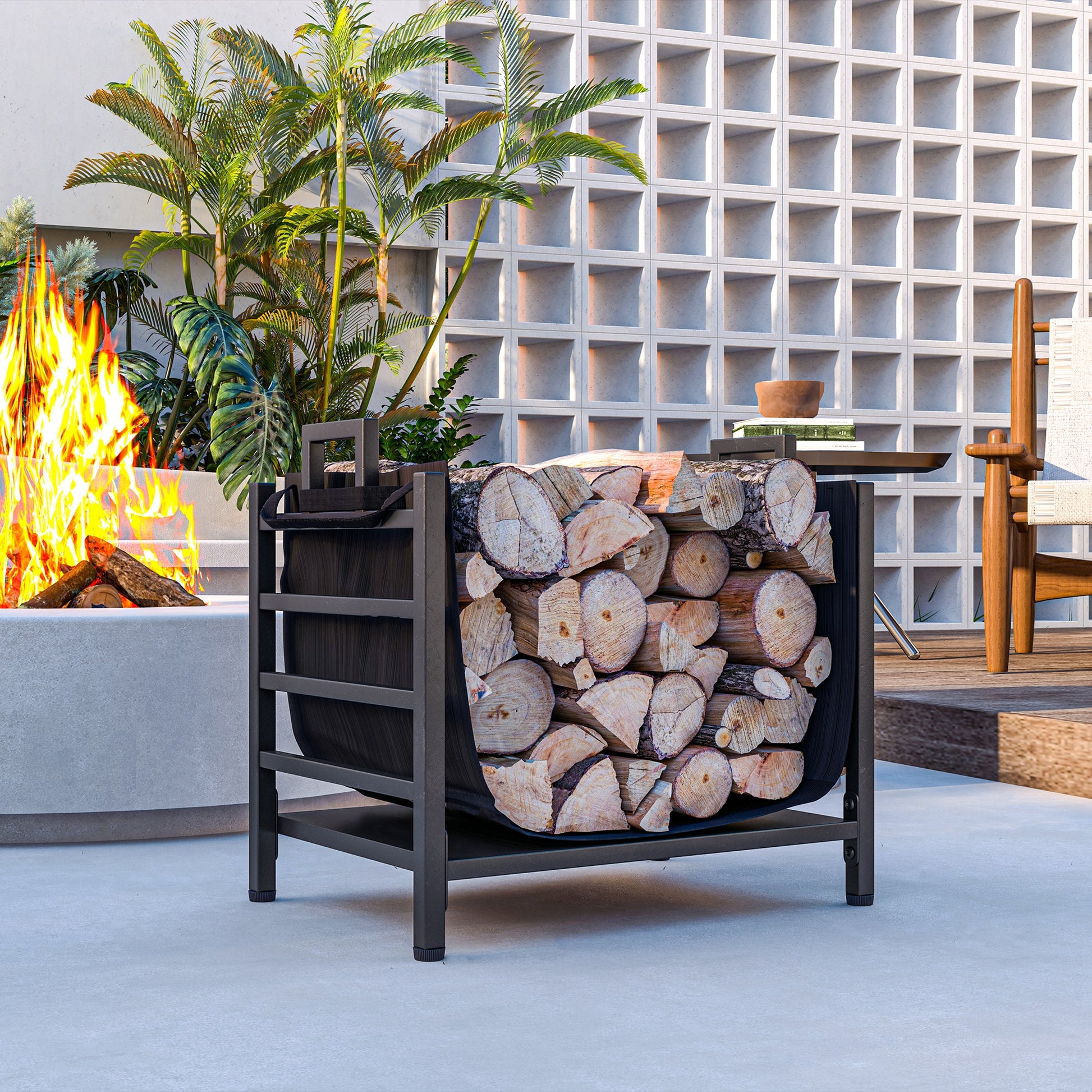 Black metal firewood rack filled with split logs for outdoor use