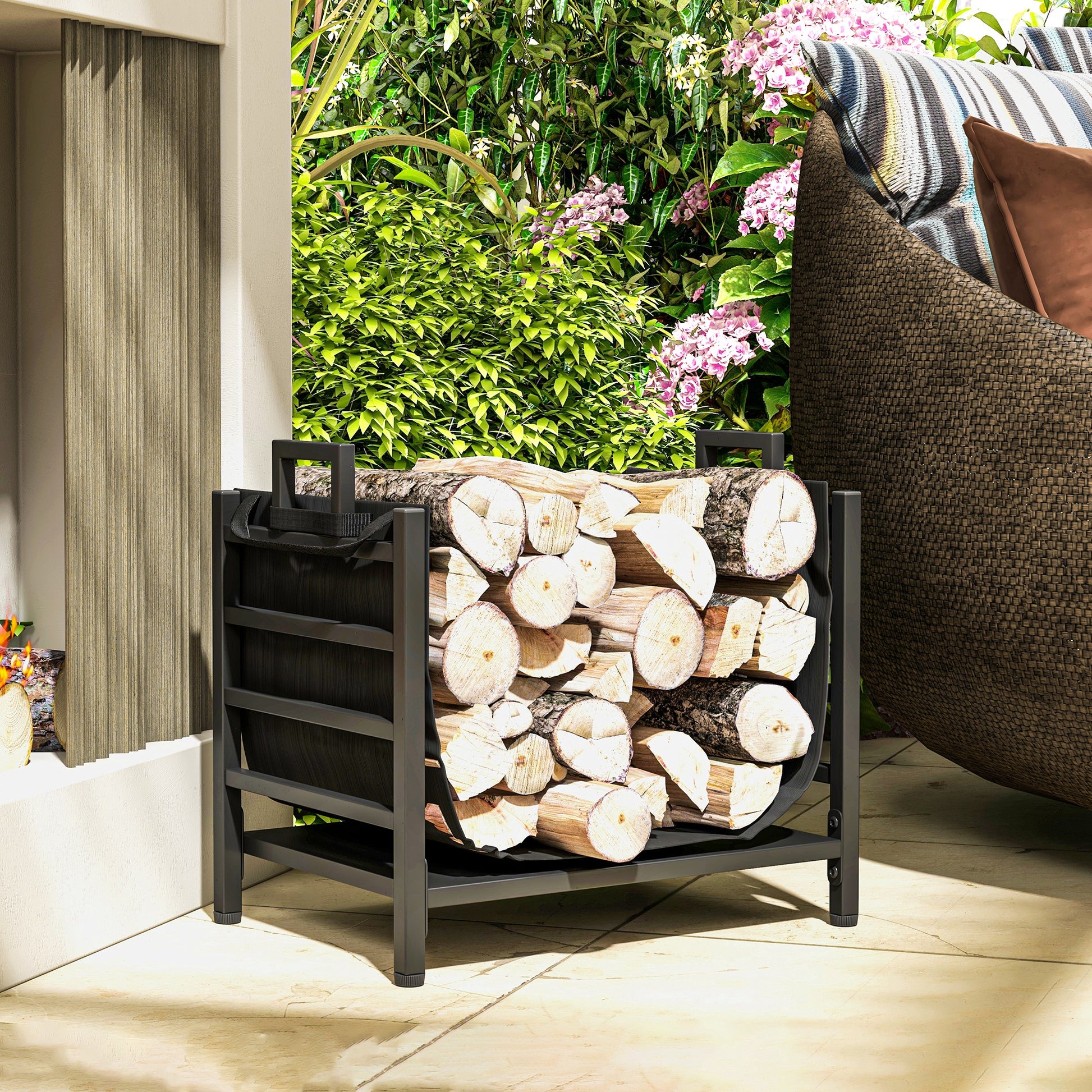 Black metal firewood rack filled with split logs designed for outdoor patio use