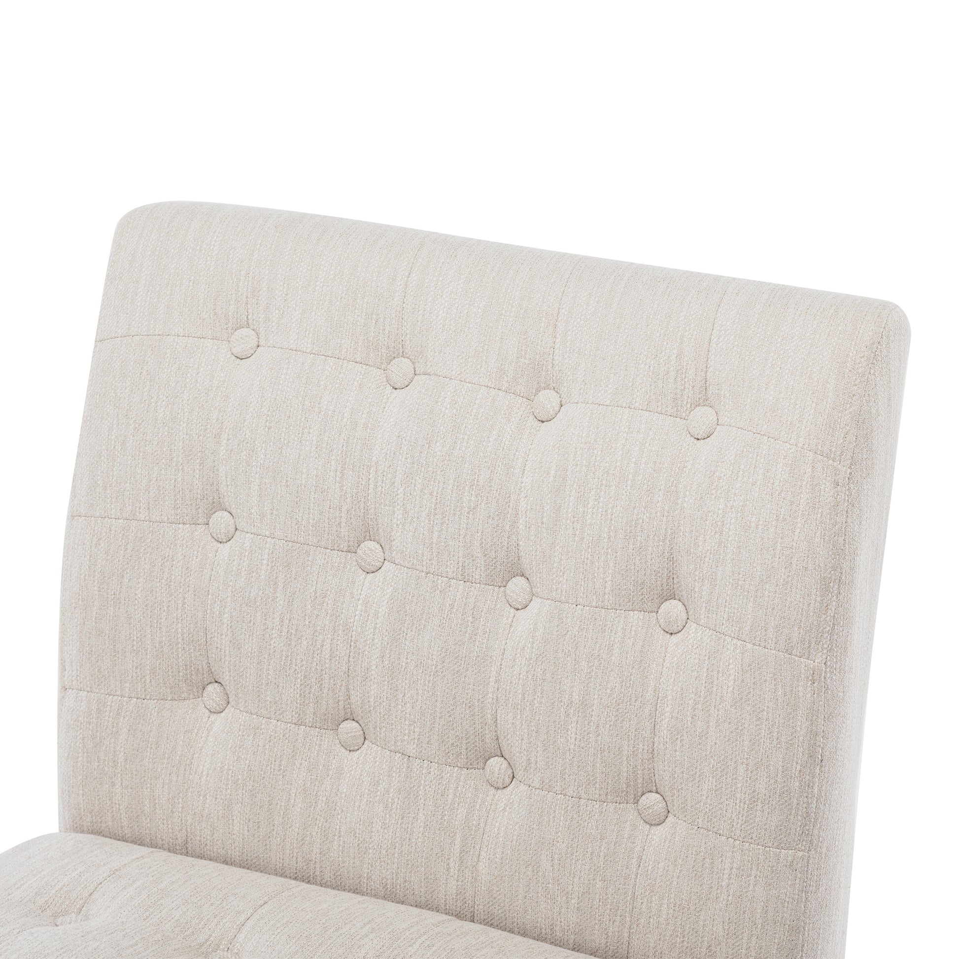 Tufted beige fabric chair back with diamond button tufting detail