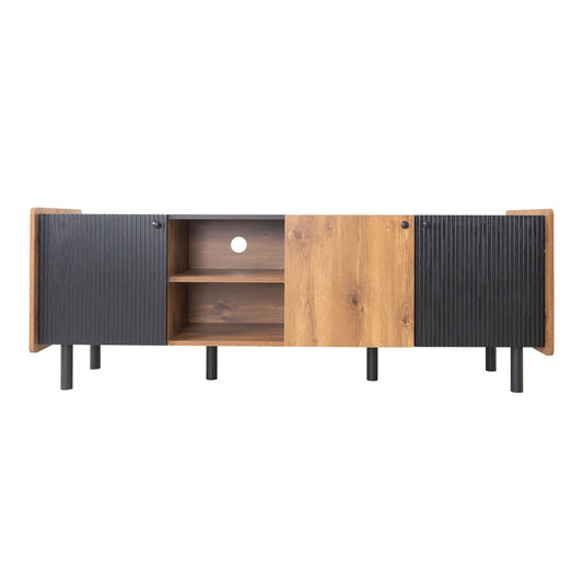 Modern media console with black ribbed doors and warm wood accents