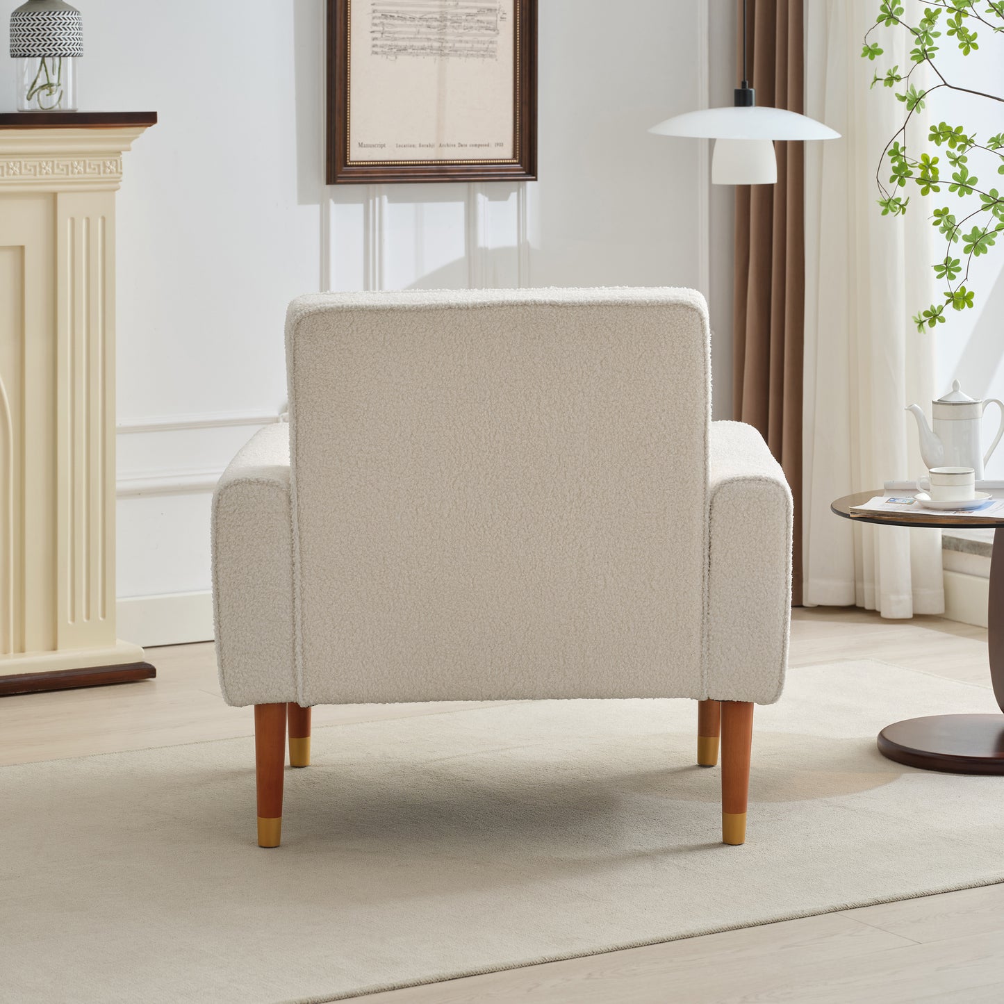 Cream teddy boucle armchair with wooden legs and gold accents modern accent chair