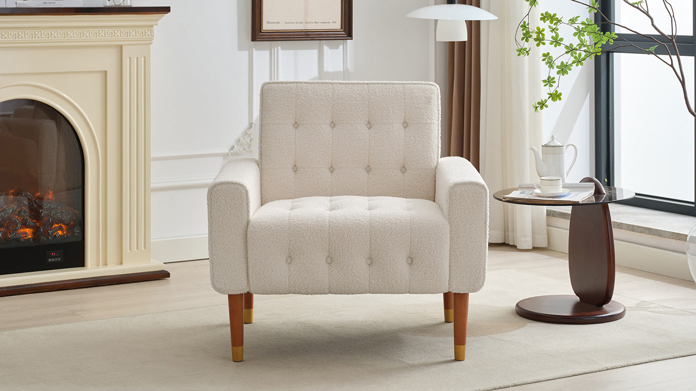 Cream boucle accent chair with diamond tufting and tapered wooden legs