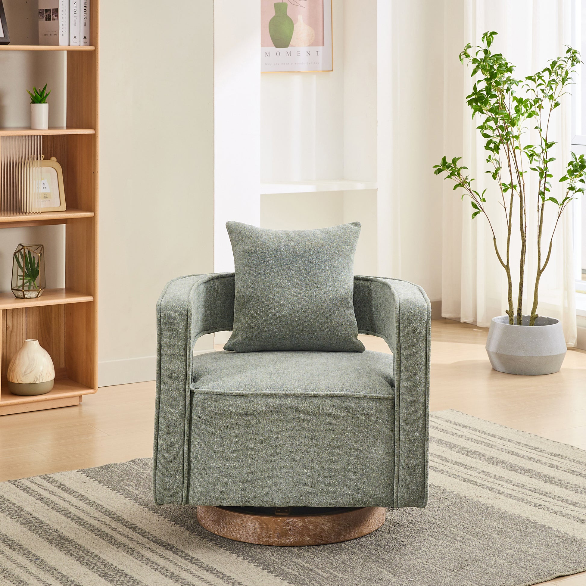Textured green fabric armchair with a wooden swivel base