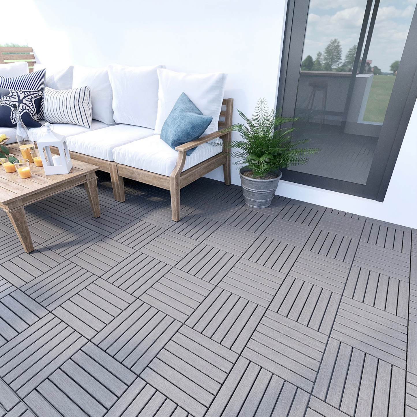 Grey interlocking deck tiles with a wood grain texture ideal for outdoor patios
