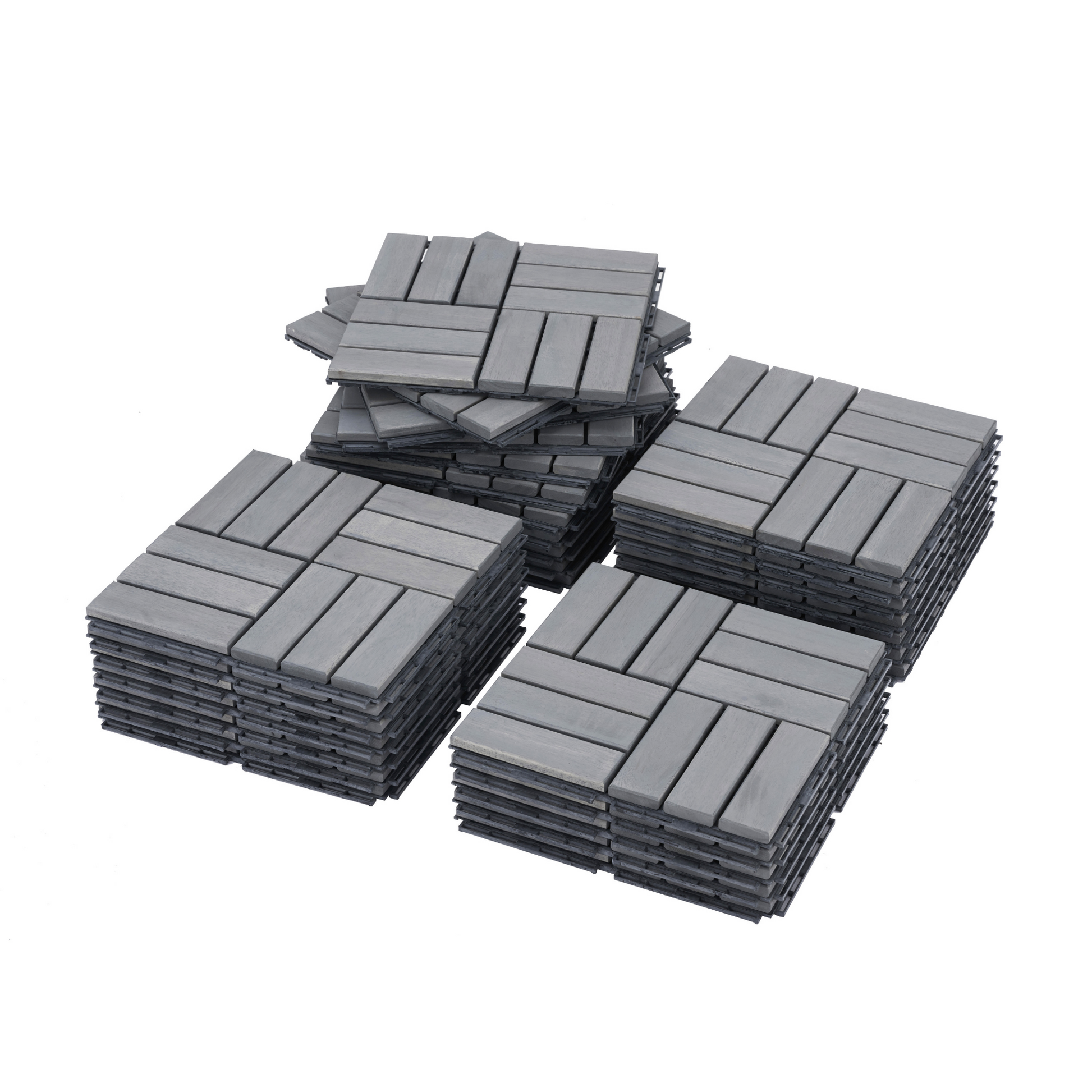Stacks of grey interlocking deck tiles with a woodgrain texture ideal for DIY patio projects