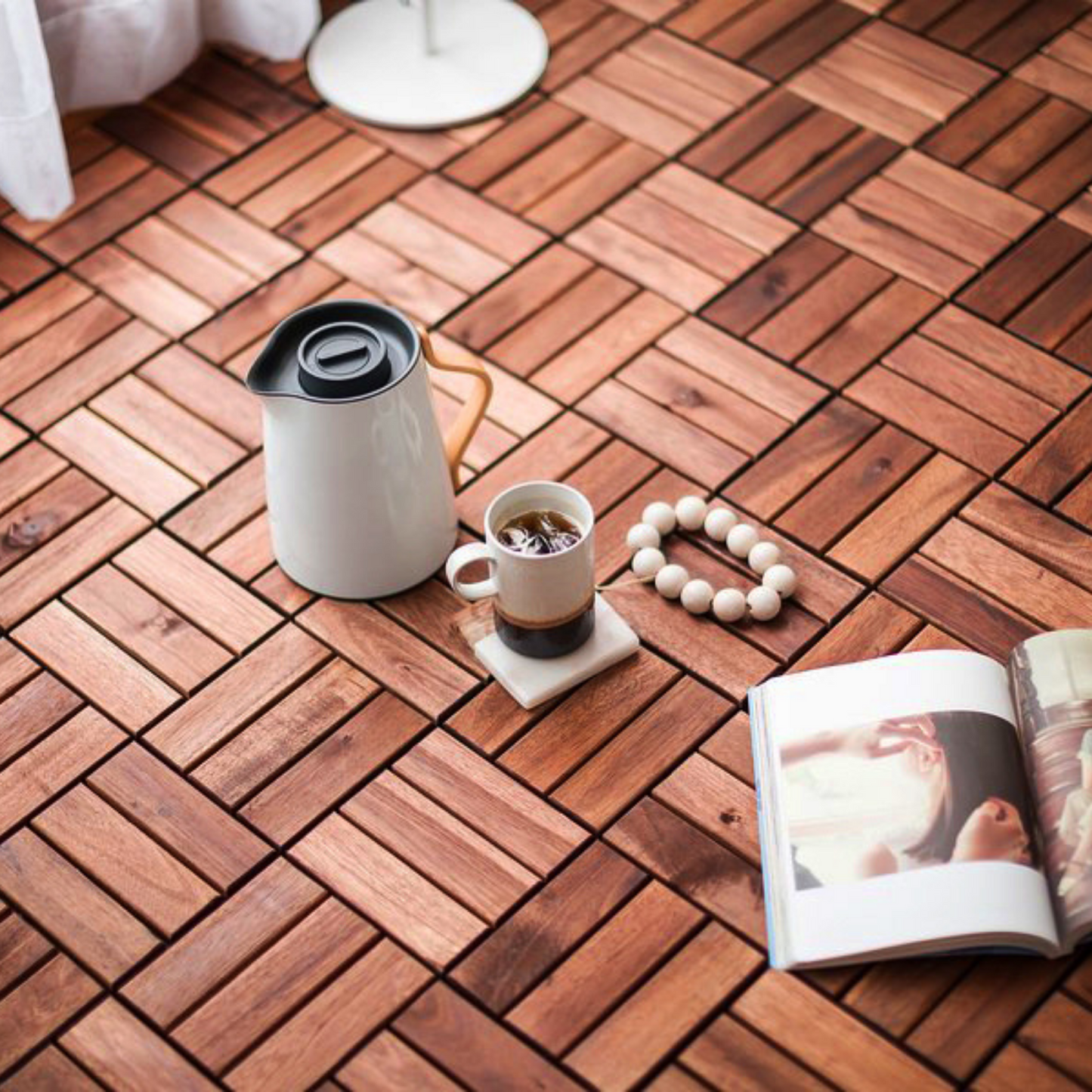 Natural wood deck tiles with herringbone pattern perfect for patios