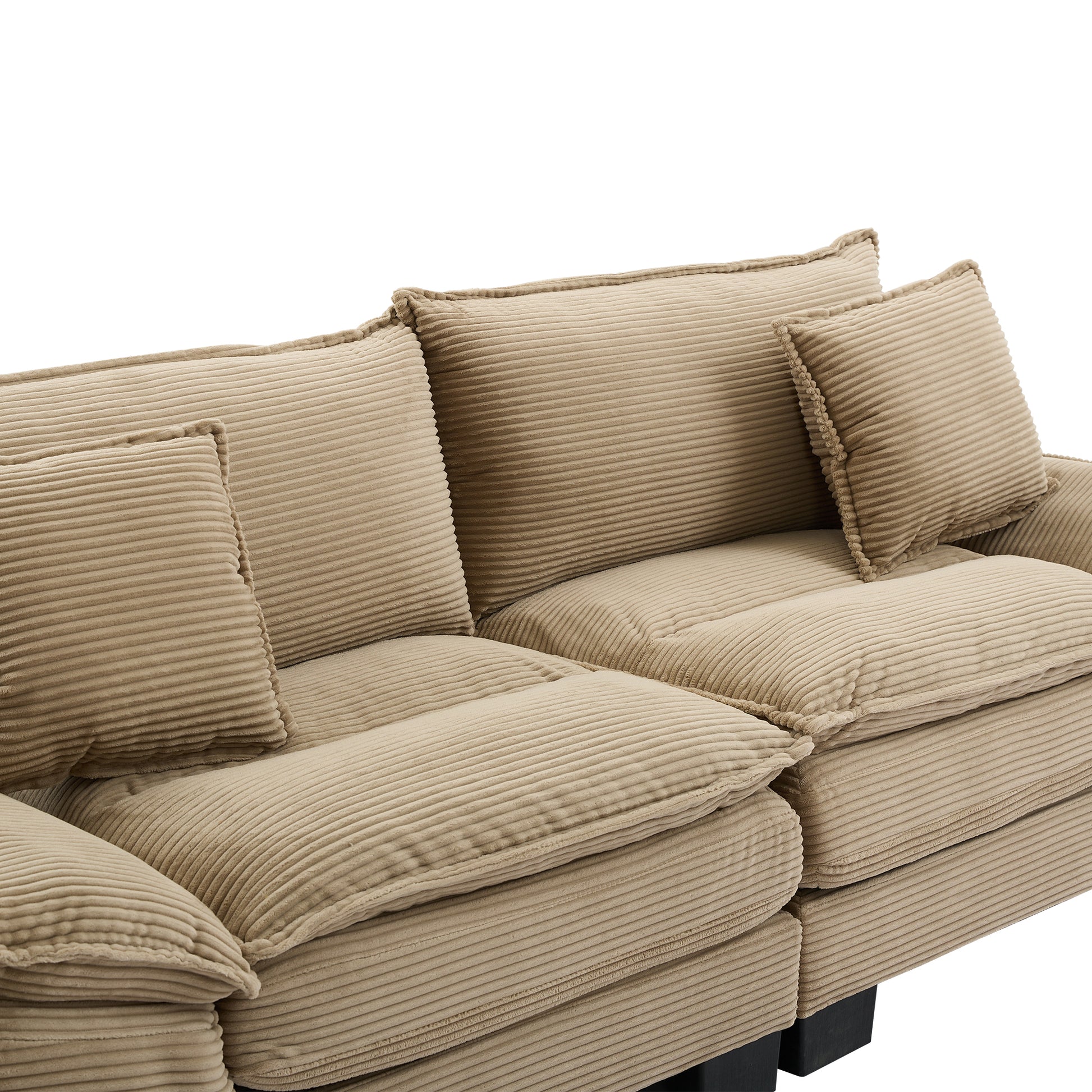 Plush beige corduroy sectional sofa with deep seats and matching throw pillows for ultimate comfort