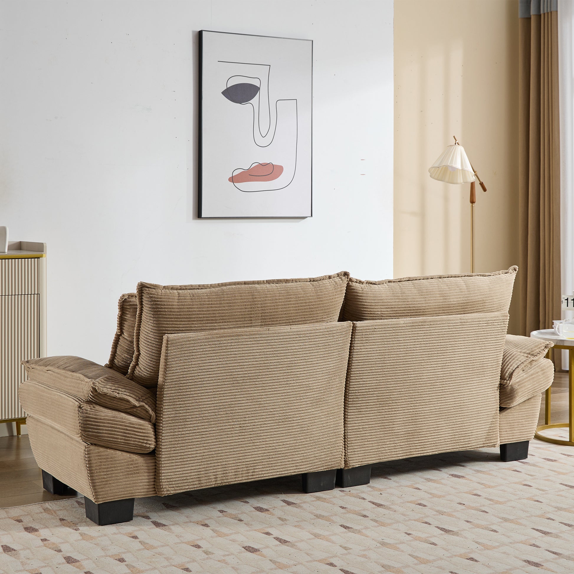 Beige corduroy sofa with plush cushions perfect for living room comfort