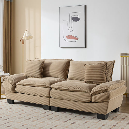 Comfortable beige corduroy sofa with plush cushions perfect for a cozy living room