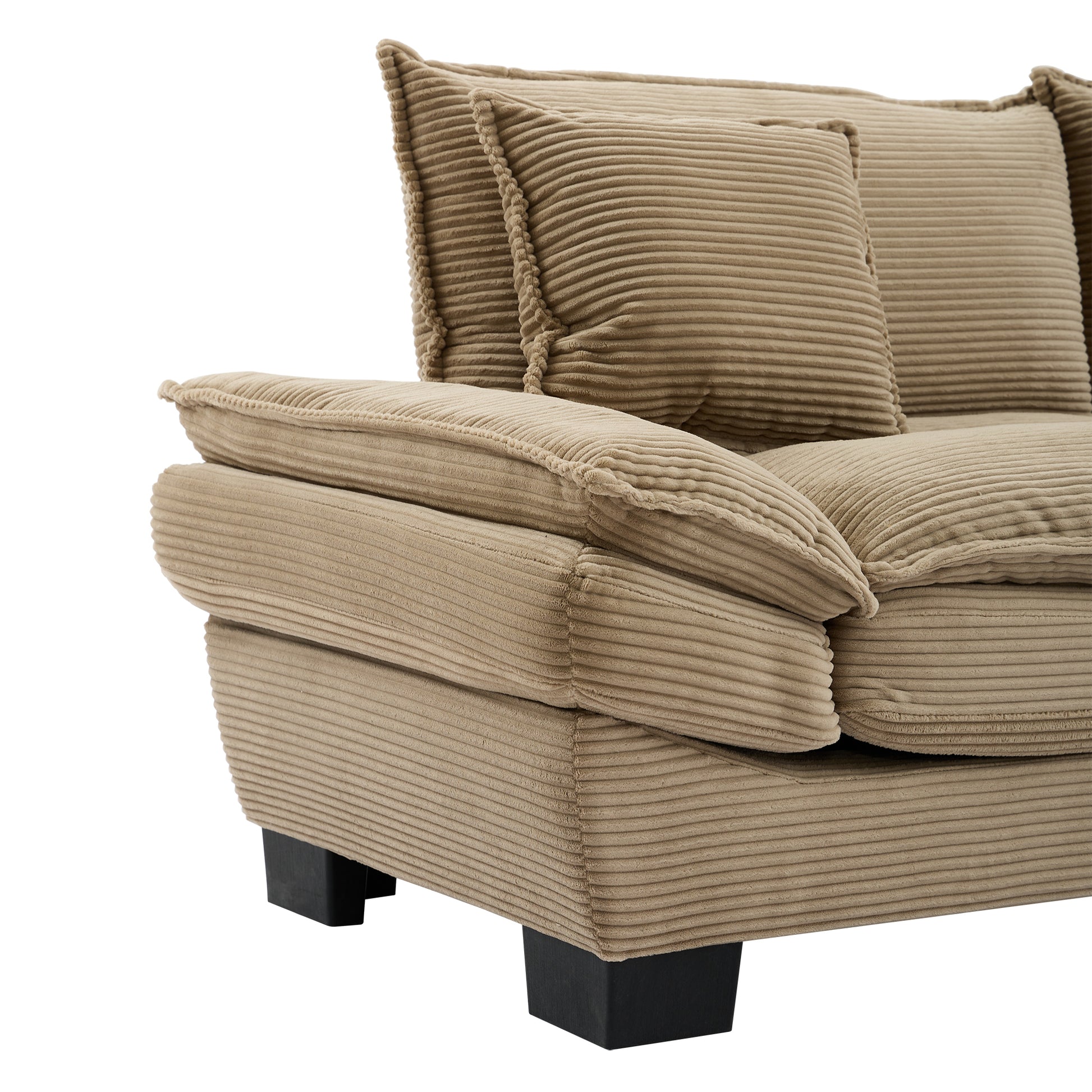 Beige corduroy sofa corner with plush cushions and black block feet