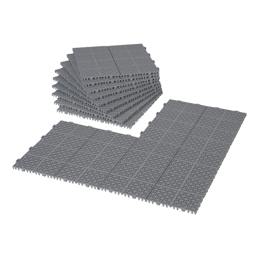 Stack of interlocking grey plastic garage floor tiles in a geometric pattern
