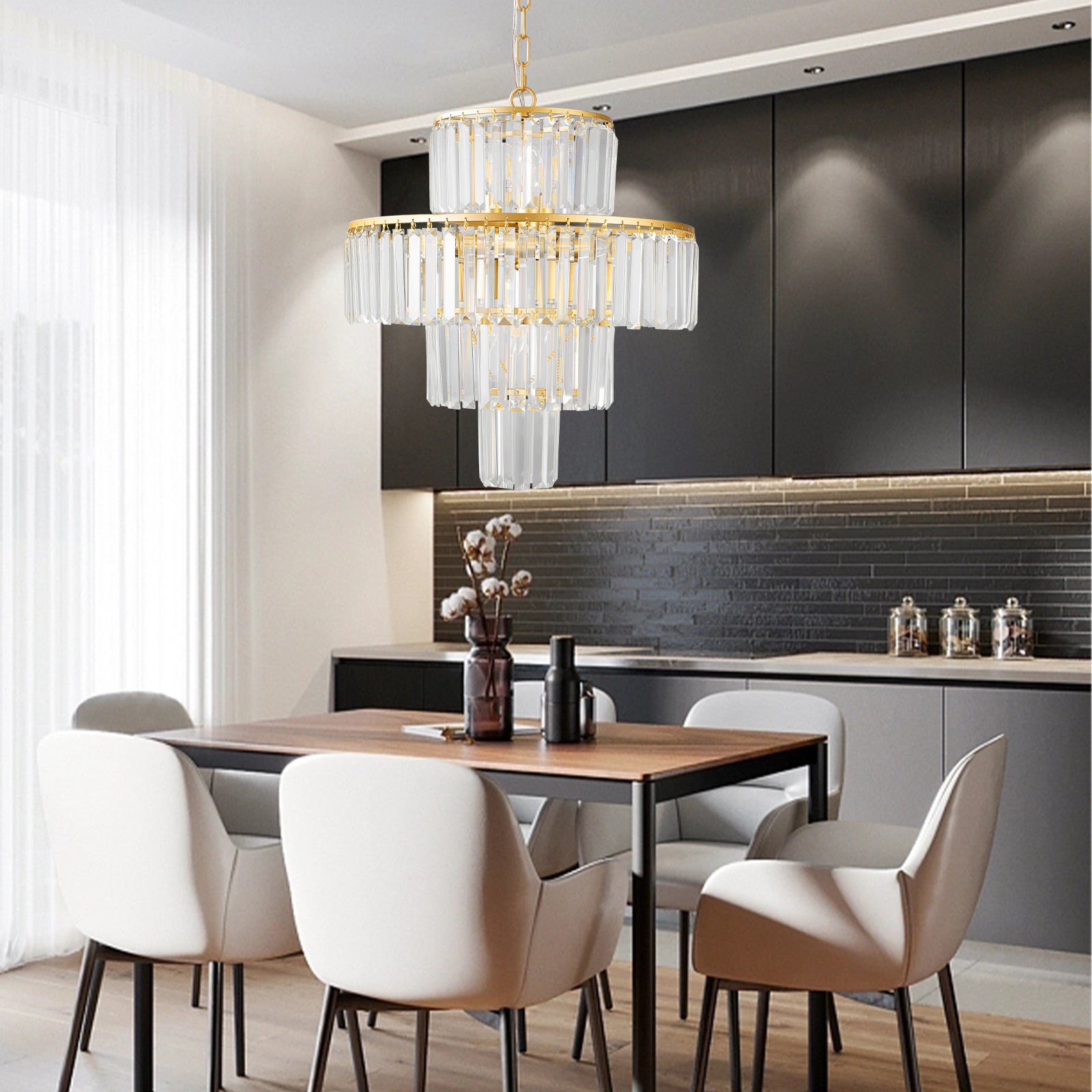 Gold and crystal tiered chandelier with geometric prismatic elements ideal for dining room lighting