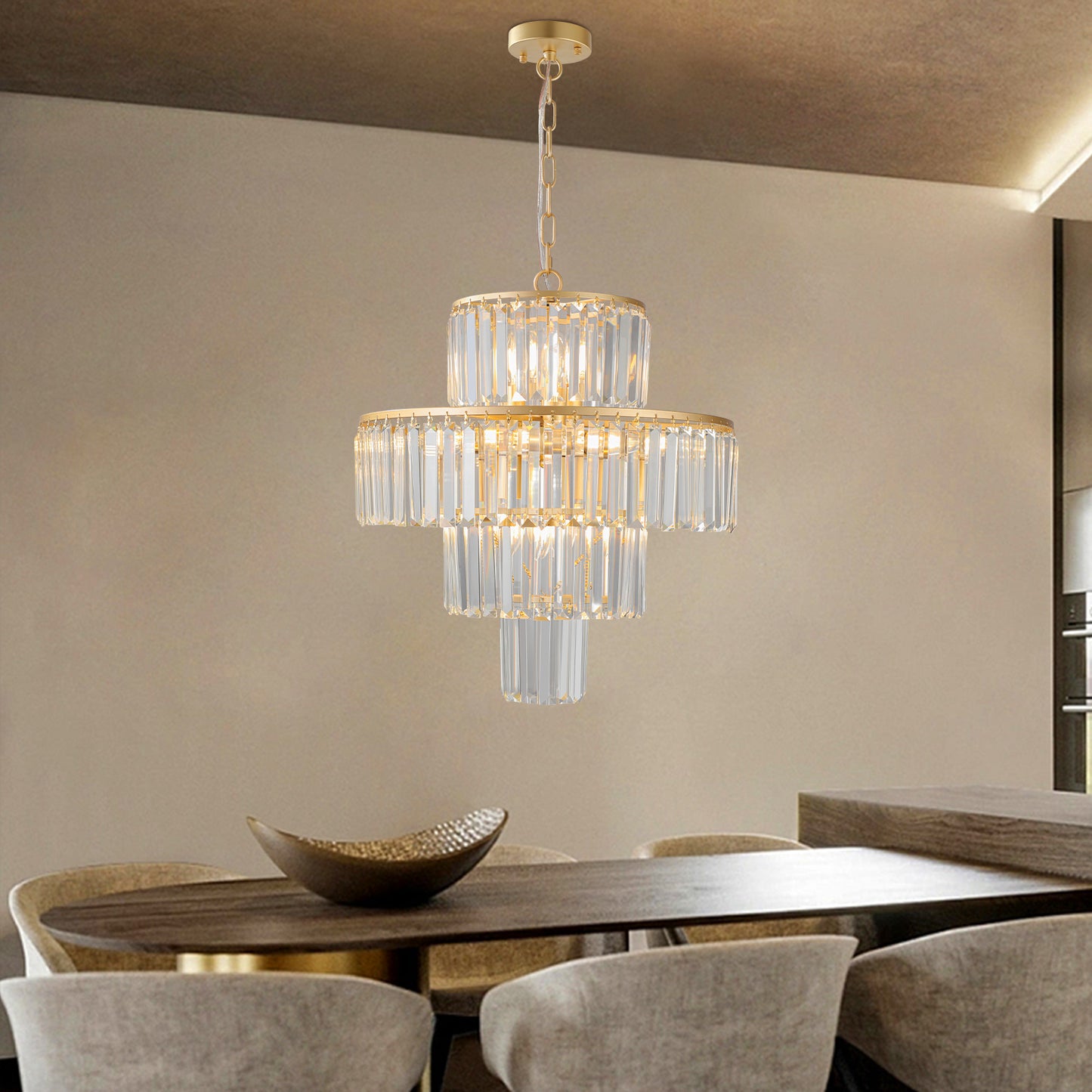 Elegant tiered crystal chandelier with gold finish ideal for dining rooms