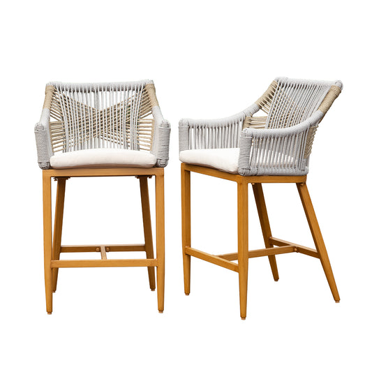 Two natural wood and white rope bar stools with beige cushions suitable for patio dining