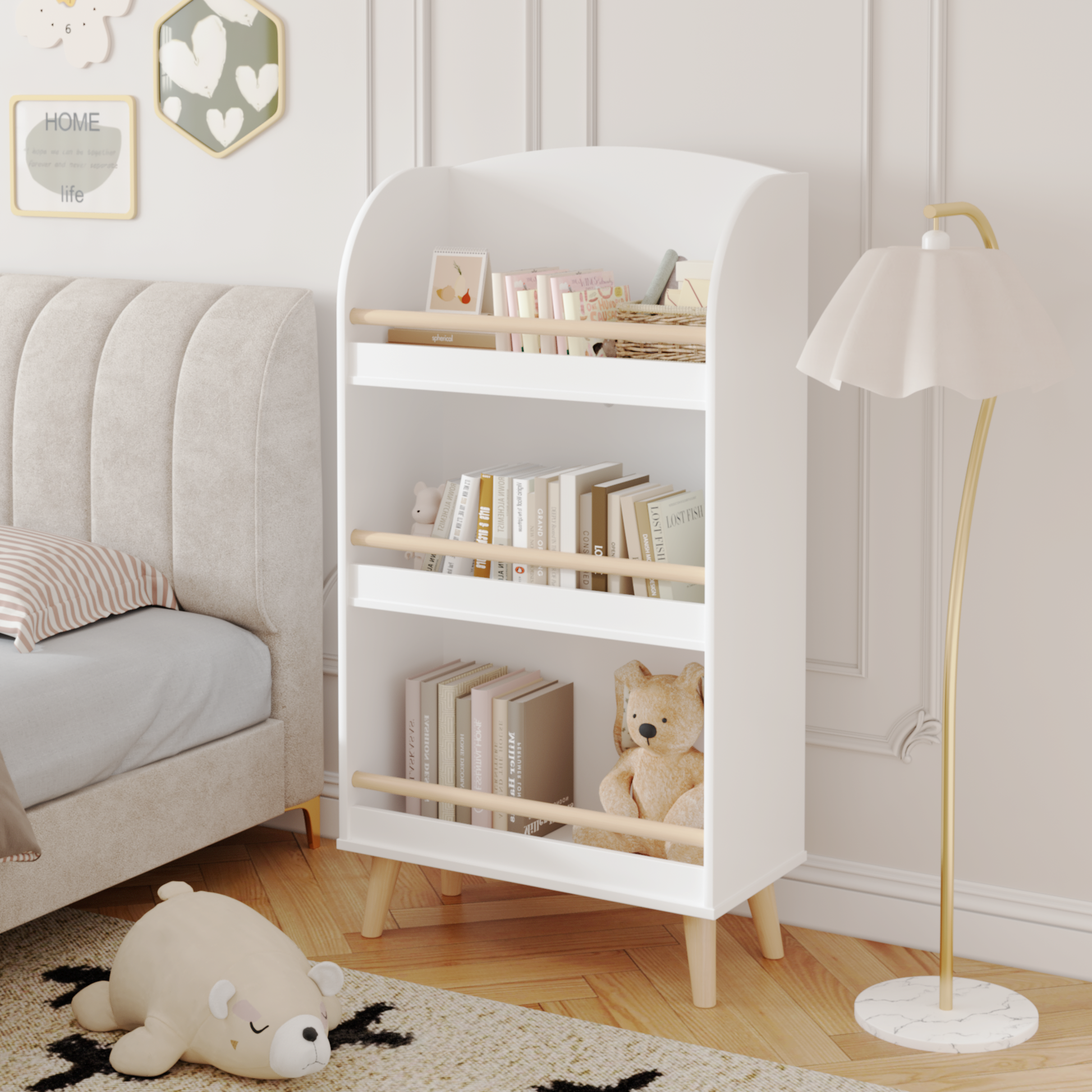 White wooden kids bookshelf with three shelves holding books and toys
