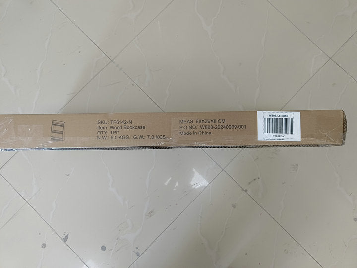 Cardboard box packaging for a wood bookcase includes item details and dimensions