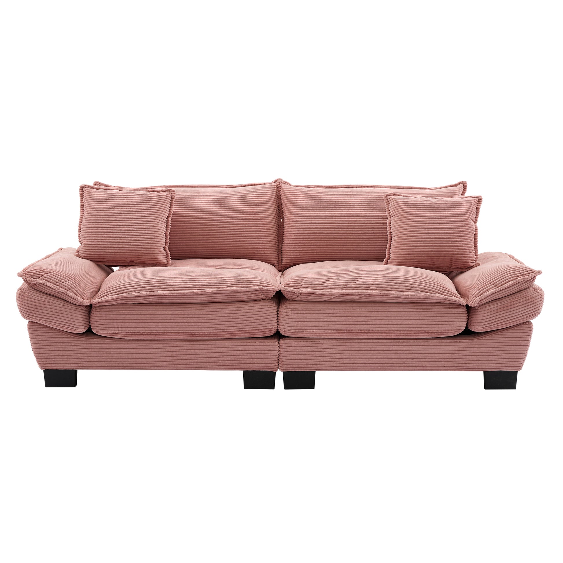 Plush pink corduroy sofa with deep seating and matching throw pillows
