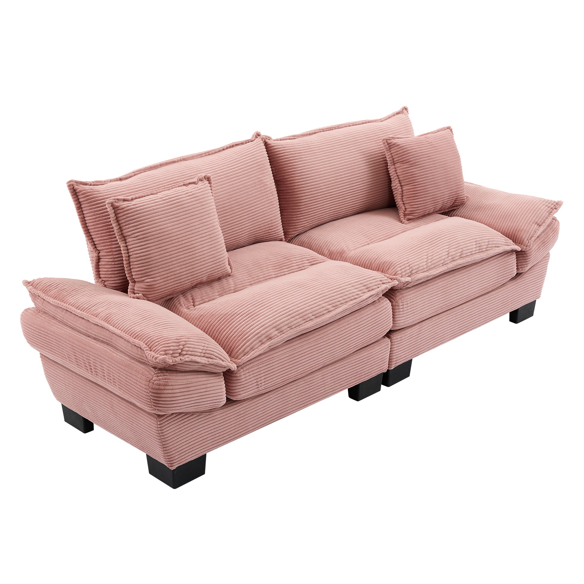Pink corduroy sofa with plush cushions and two accent pillows perfect for a cozy living room