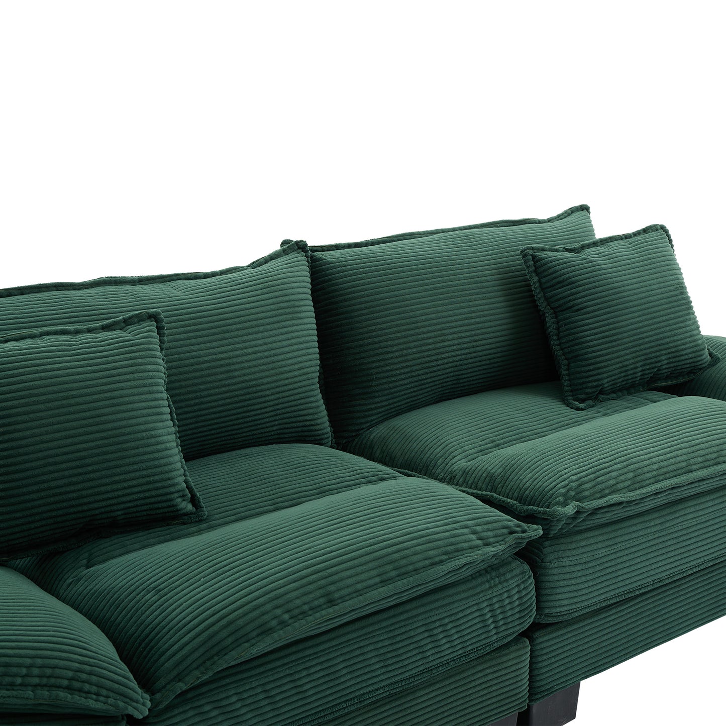 Deep green corduroy sectional sofa with plush cushions perfect for a cozy living room
