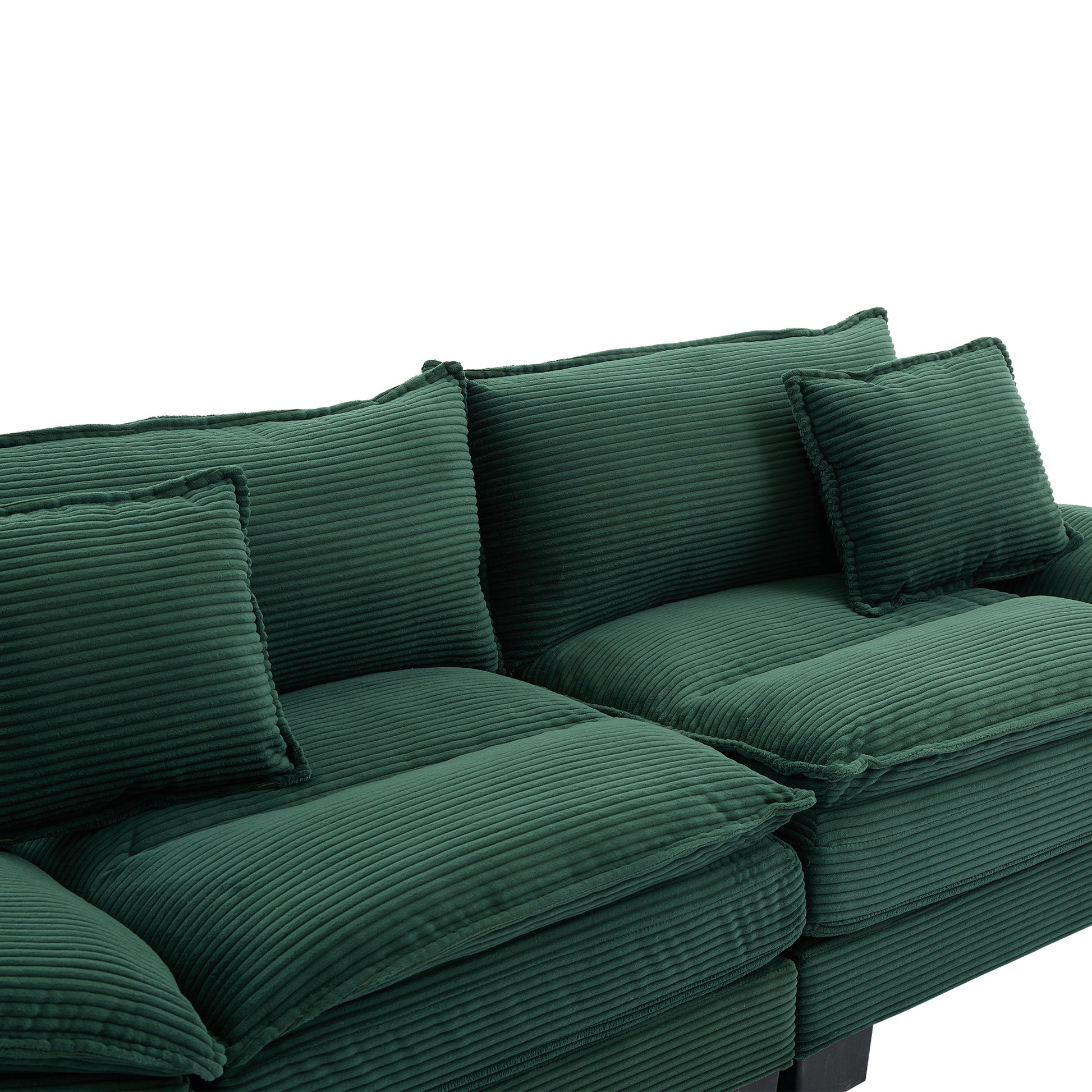 Deep green corduroy sectional sofa with plush cushions perfect for a cozy living room