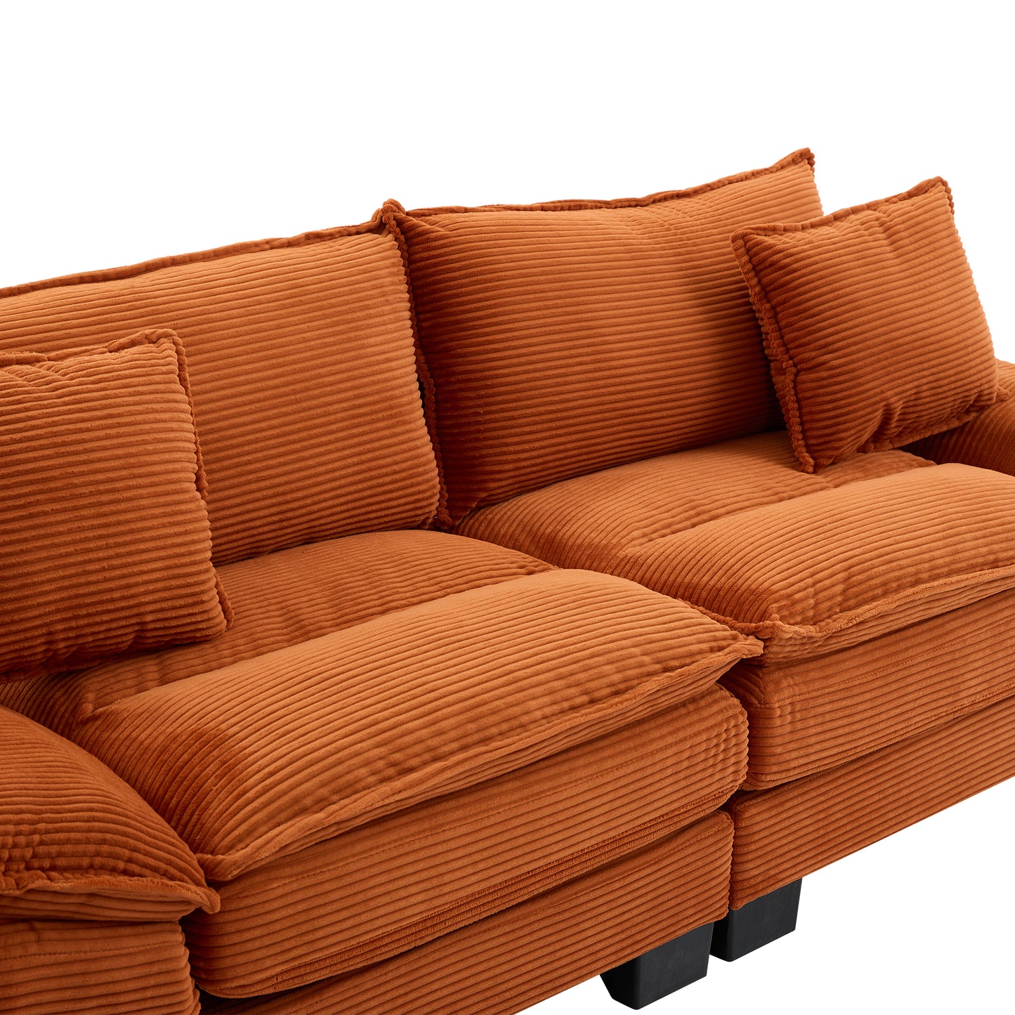 Burnt orange corduroy sofa with plush cushions and modern black legs