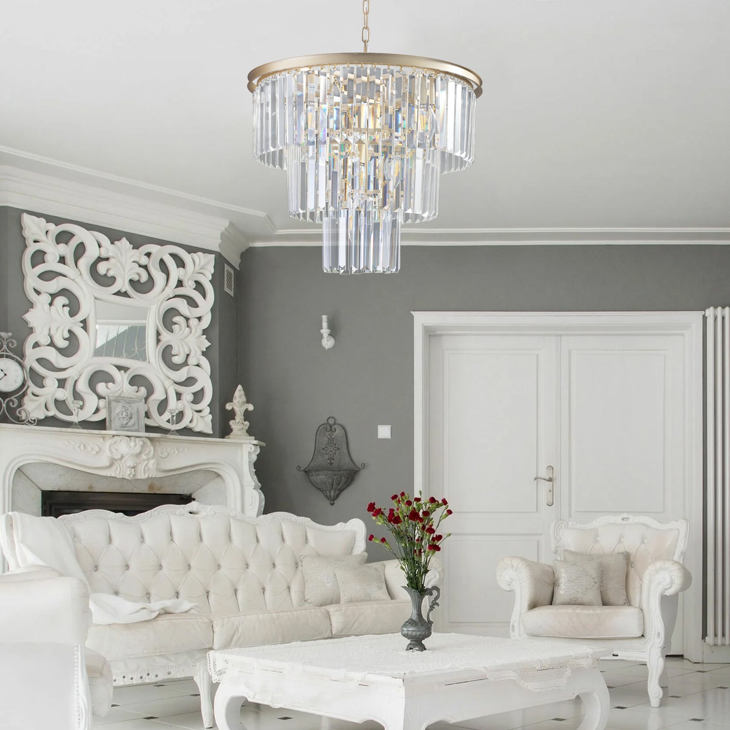 A tiered gold chandelier with clear crystal prisms provides opulent lighting