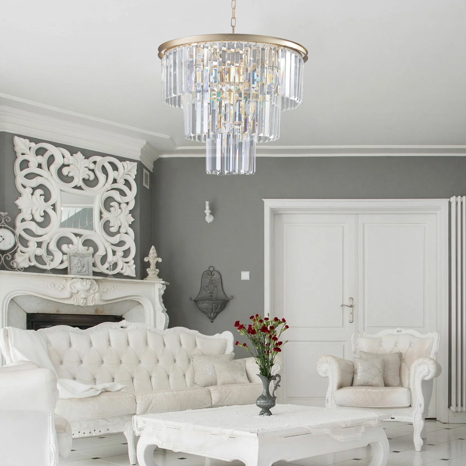 A tiered gold chandelier with clear crystal prisms provides opulent lighting