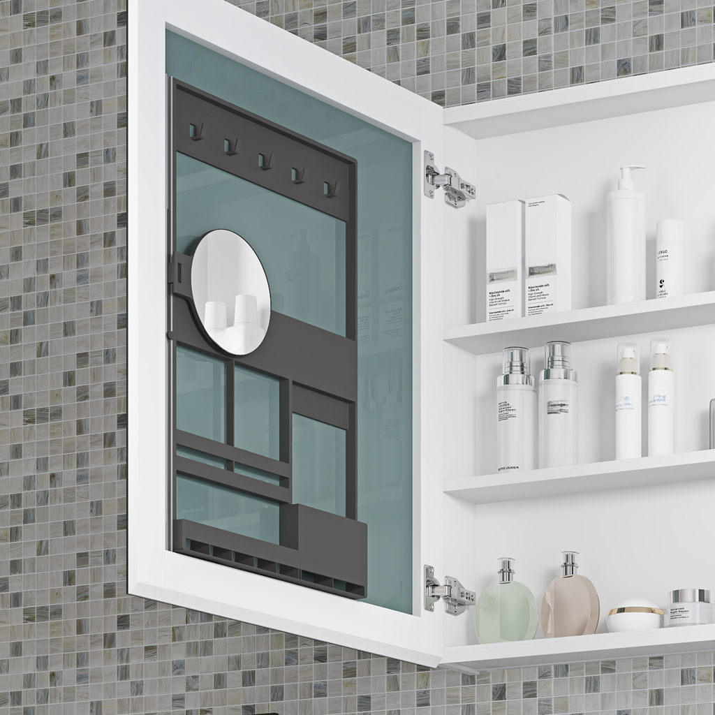 White recessed medicine cabinet with mirrored door and shelves stocked with skincare products