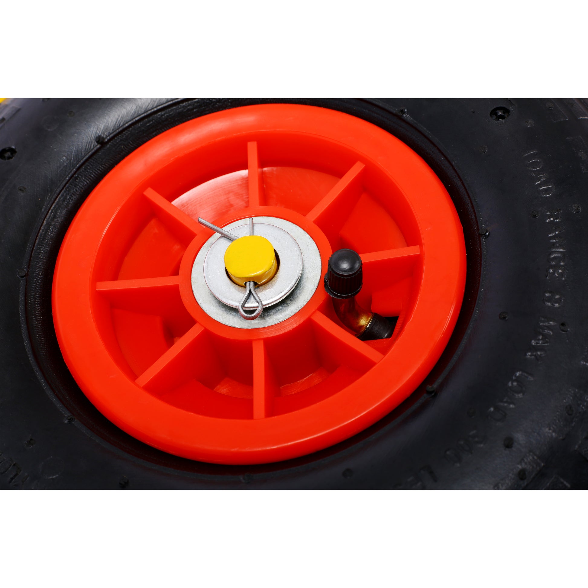 Black pneumatic wheel with bright orange plastic rim and valve stem