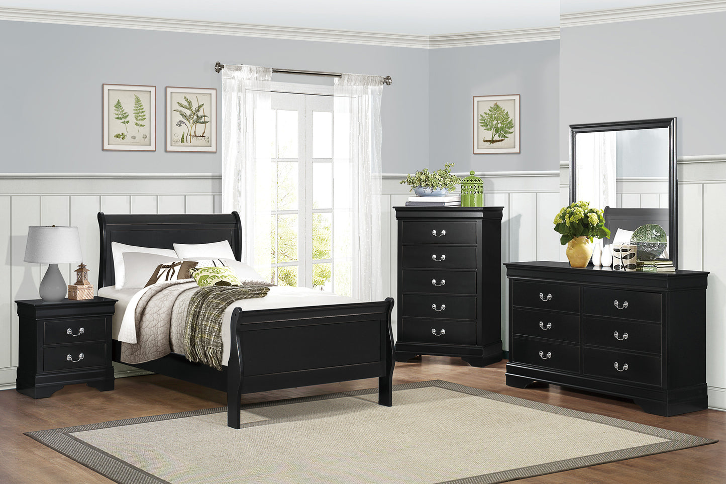Black sleigh bed with elegant curves and comfortable bedding