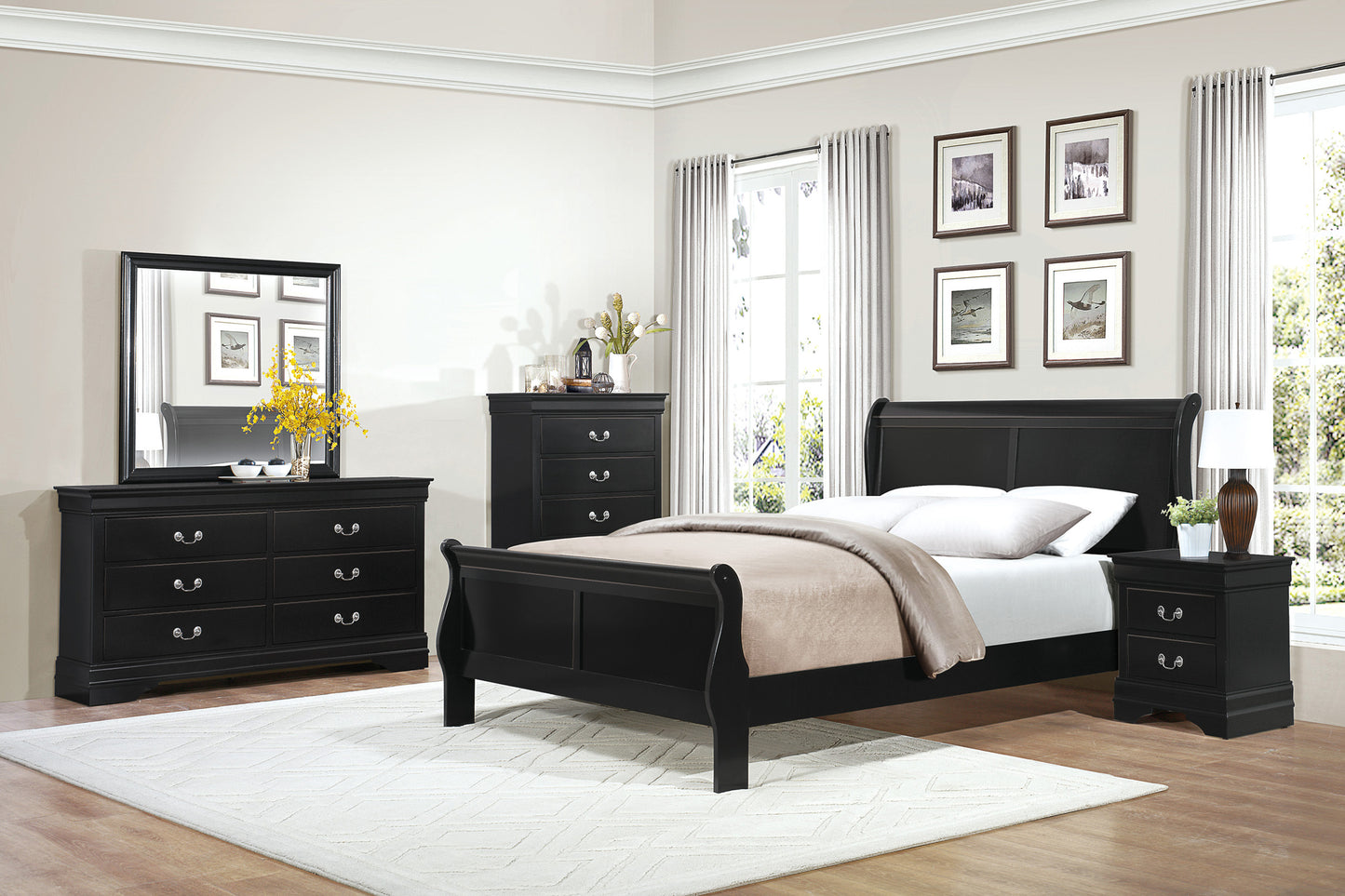 Black sleigh bed frame with tufted headboard and matching dresser