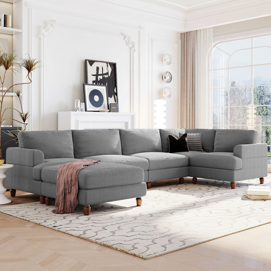 Grey corduroy sectional sofa with chaise and wooden legs perfect for modern living rooms