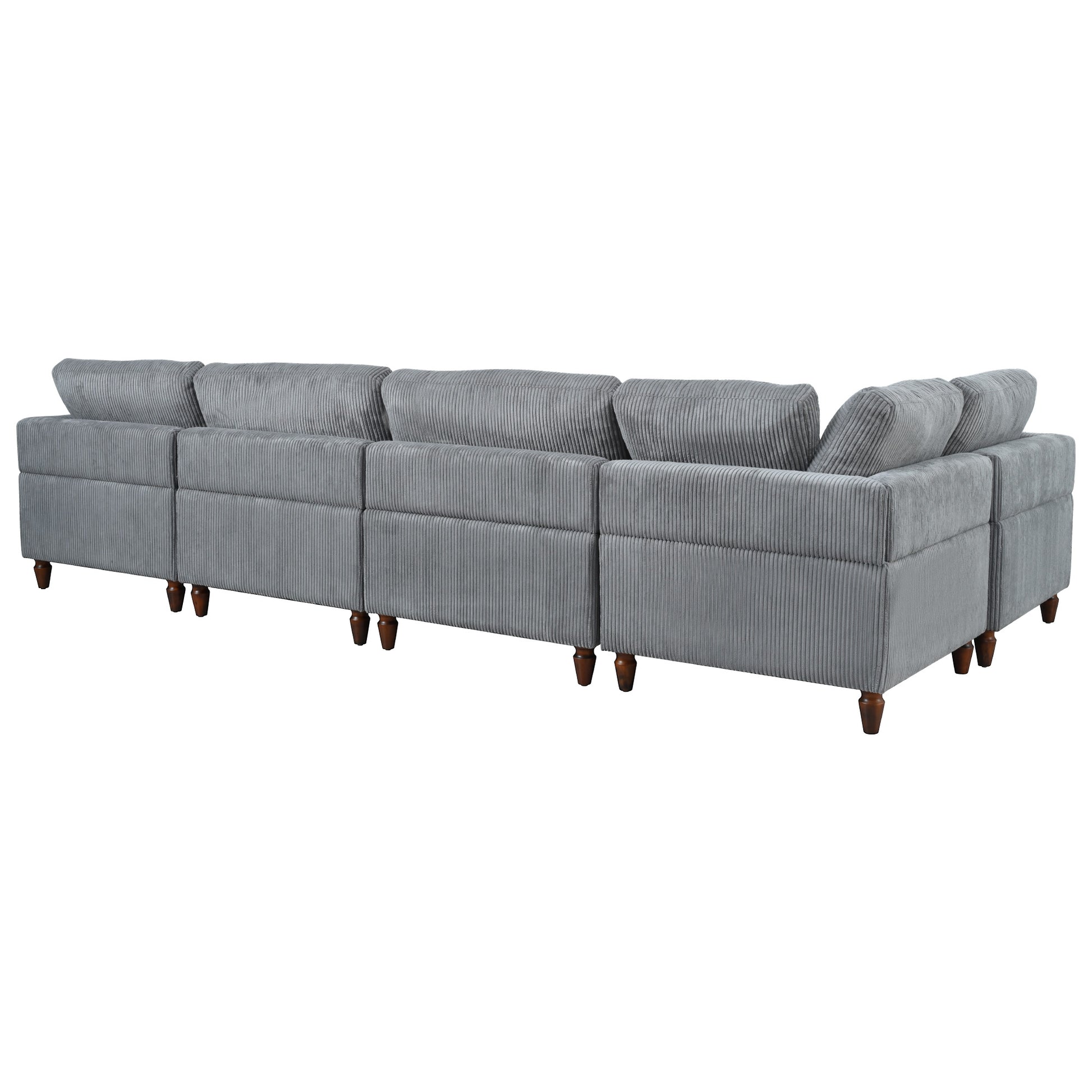 Gray corduroy sectional sofa with plush cushions and dark wooden legs