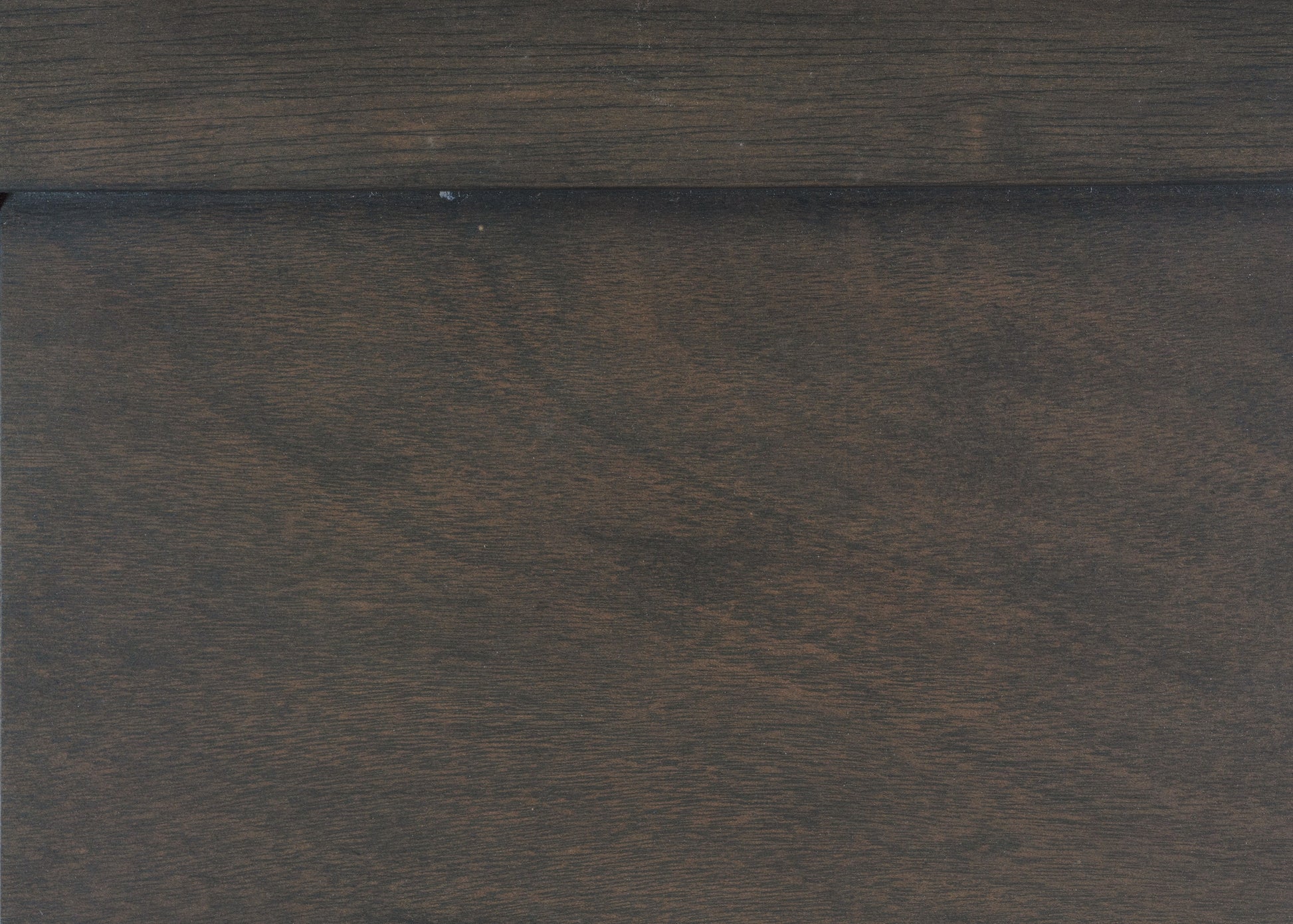 Dark oak wood veneer with visible grain for furniture