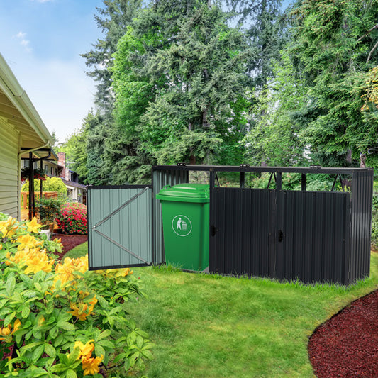 Modern metal outdoor trash enclosure with a green bin for garden waste management
