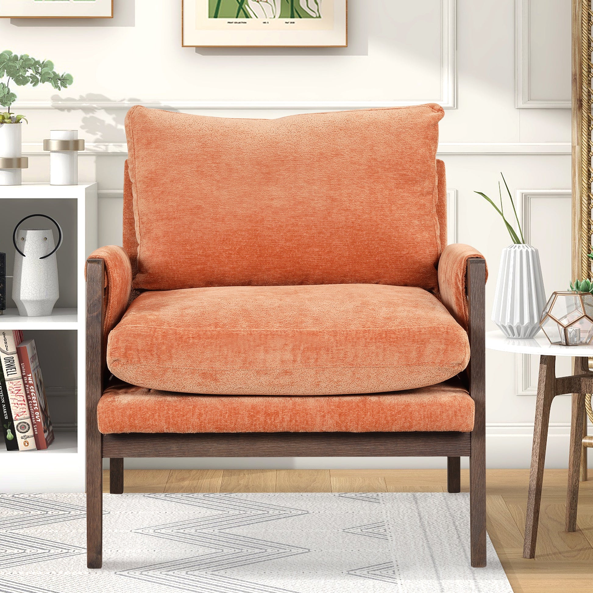 Orange velvet accent chair with dark wood frame perfect for living rooms