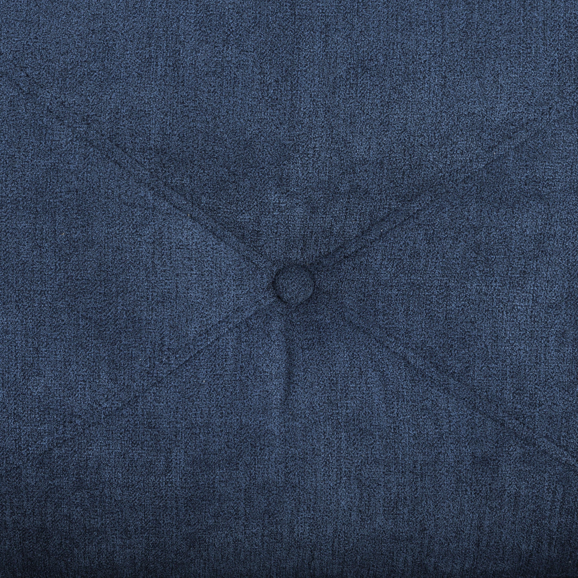Navy blue velvet fabric with diamond tufting and a central button perfect for upholstery projects