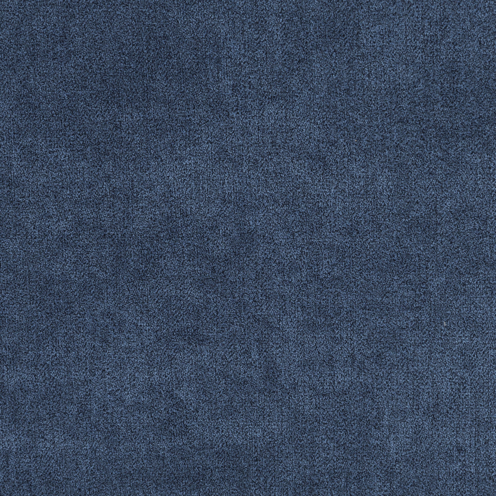 Closeup of a textured dark blue fabric swatch
