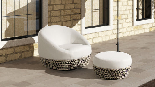 Comfortable white armchair with a woven base perfect for patio relaxation