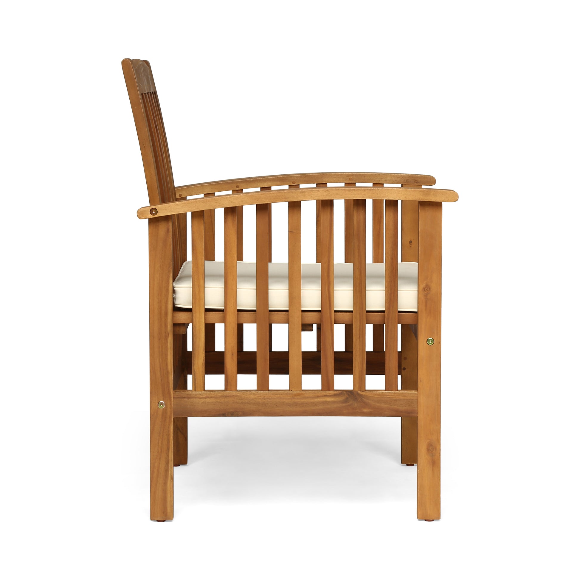 Side view of a natural wood outdoor chair with a cream cushion